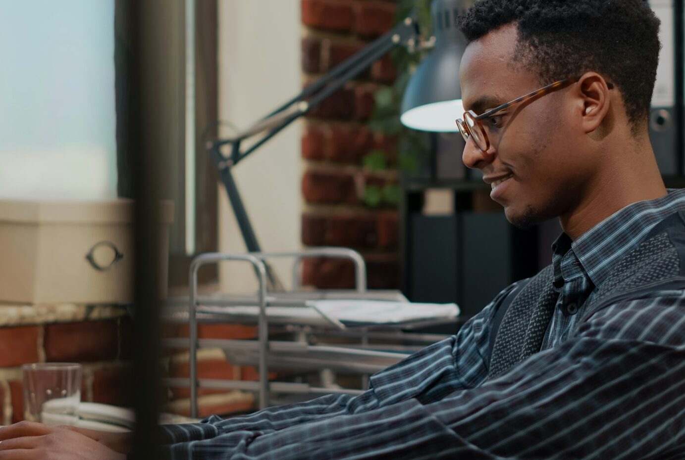 Company employee looking at laptop screen to plan career success